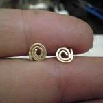 Gold spiral post earrings